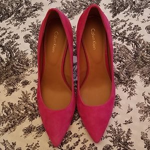 Pink suede pumps